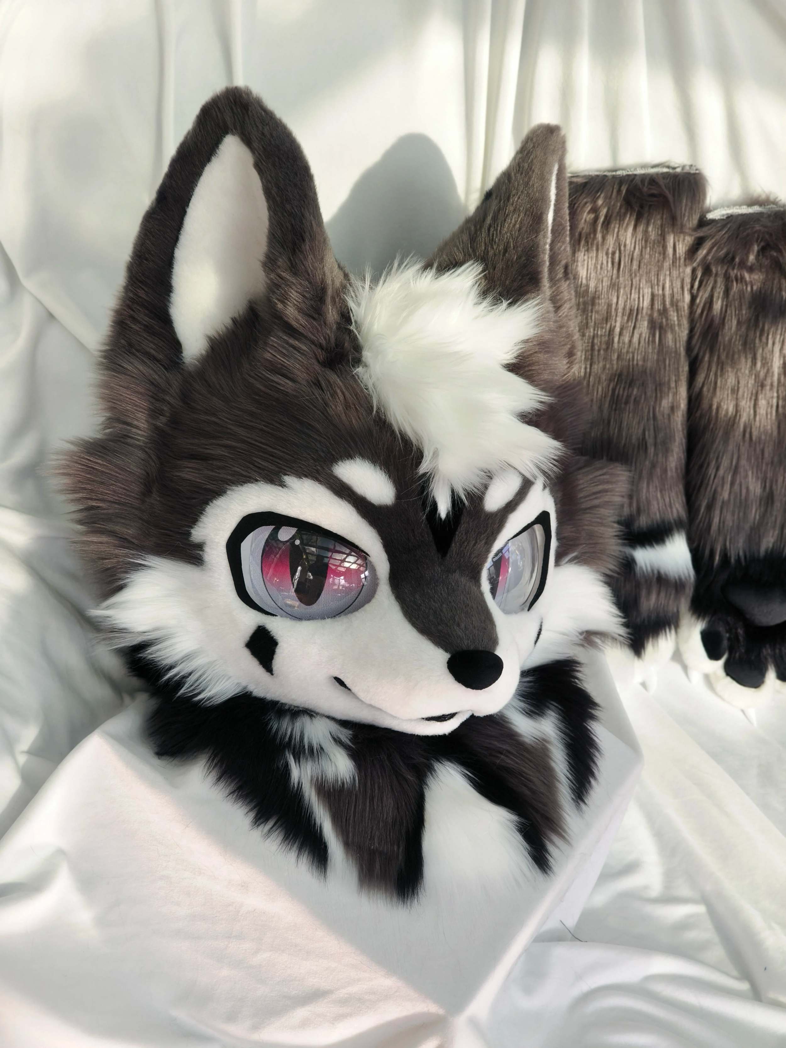 Dark wolf kemono fursuit head with pink eyes and spot markings custom handmade commission